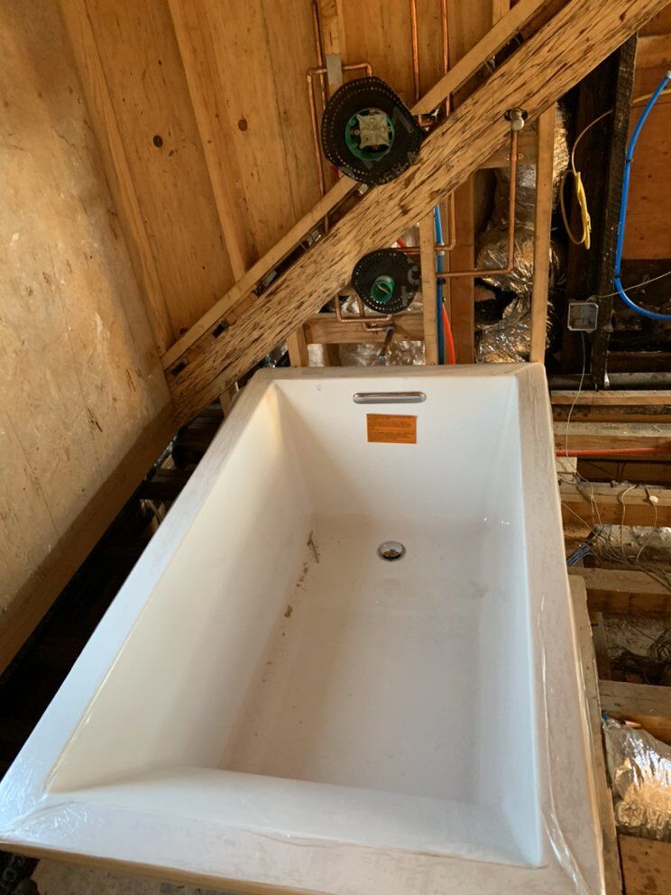 Tub set with rough-in valves